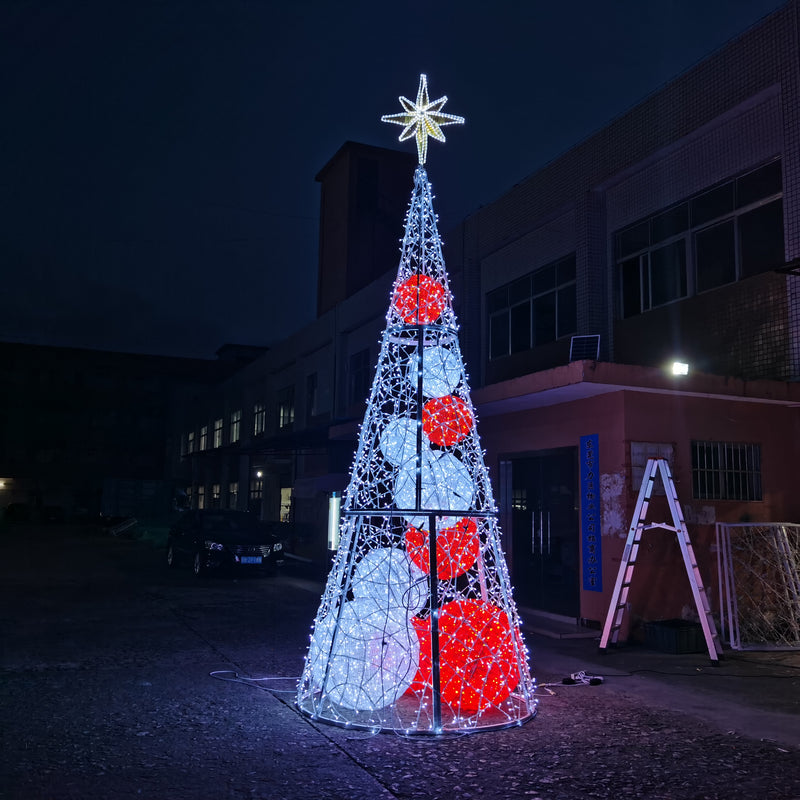 Picture of pre-lit Christmas Tree with large LED balls inside and a white LED star on top 